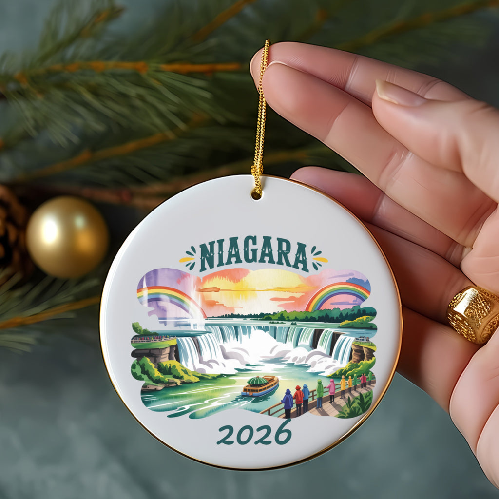 Niagara Falls 2026 ornament with rainbow and people on a boardwalk.