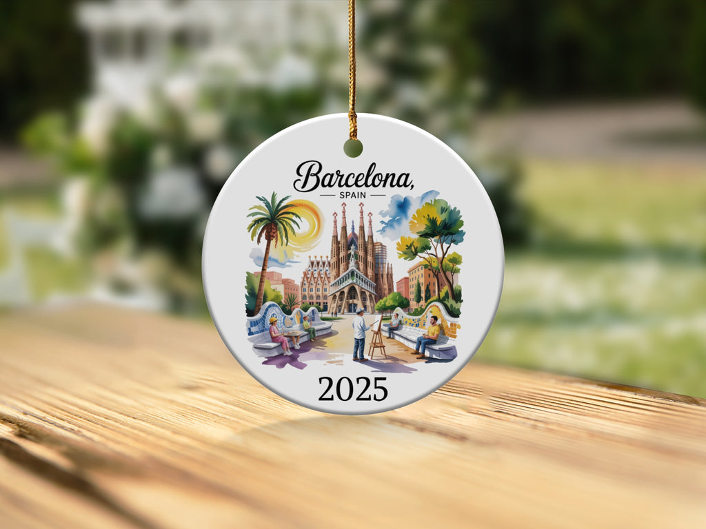 Round ornament depicting Park Güell, Barcelona, with people and the Sagrada Familia in background.