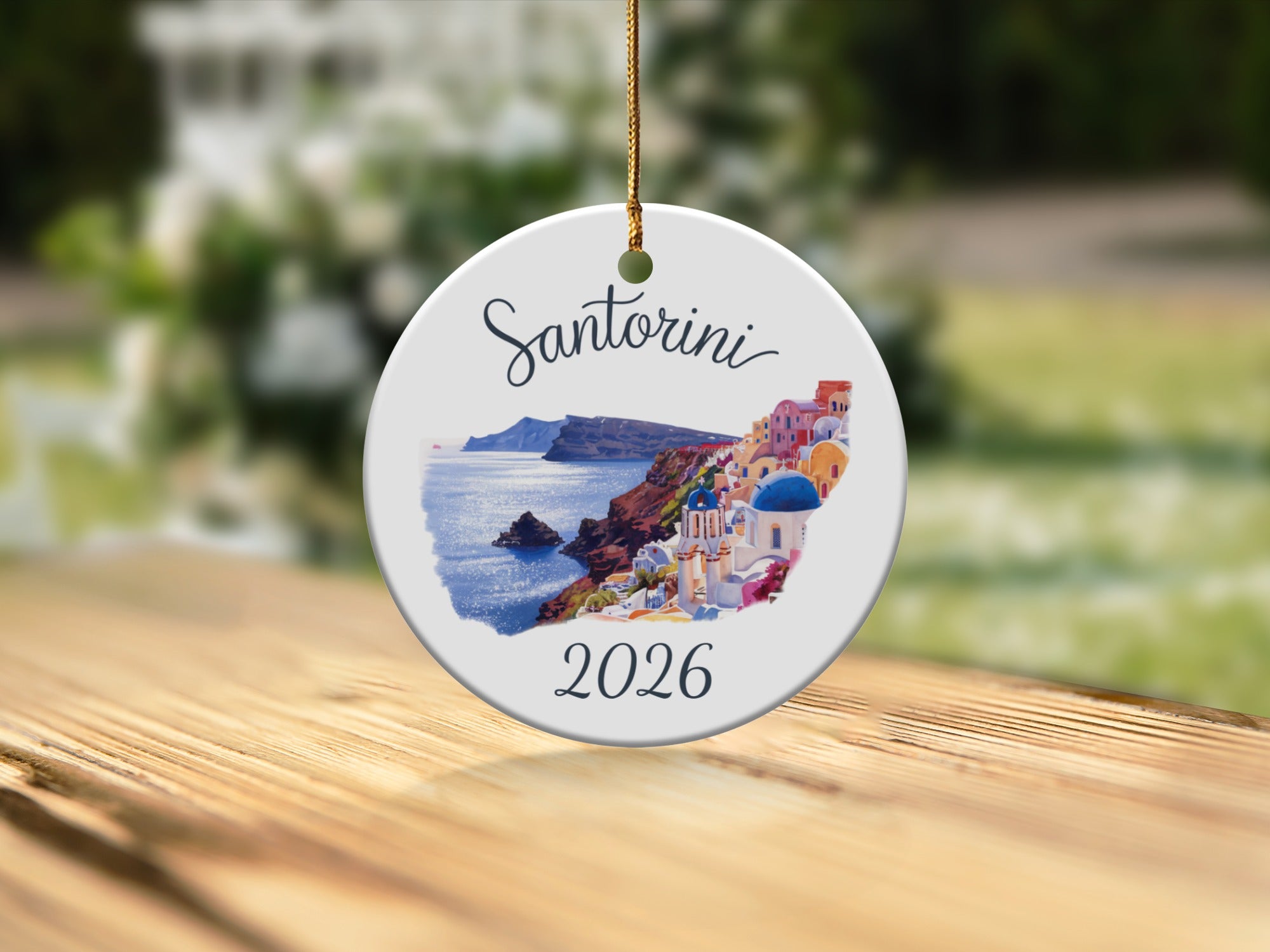 Santorini 2026 ceramic ornament featuring white buildings on a cliffside.