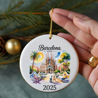 Round ceramic ornament featuring Barcelona's Sagrada Familia and "Barcelona, Spain 2025".
