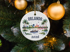 Round ornament with "Orlando 2026" text and a tropical scene.