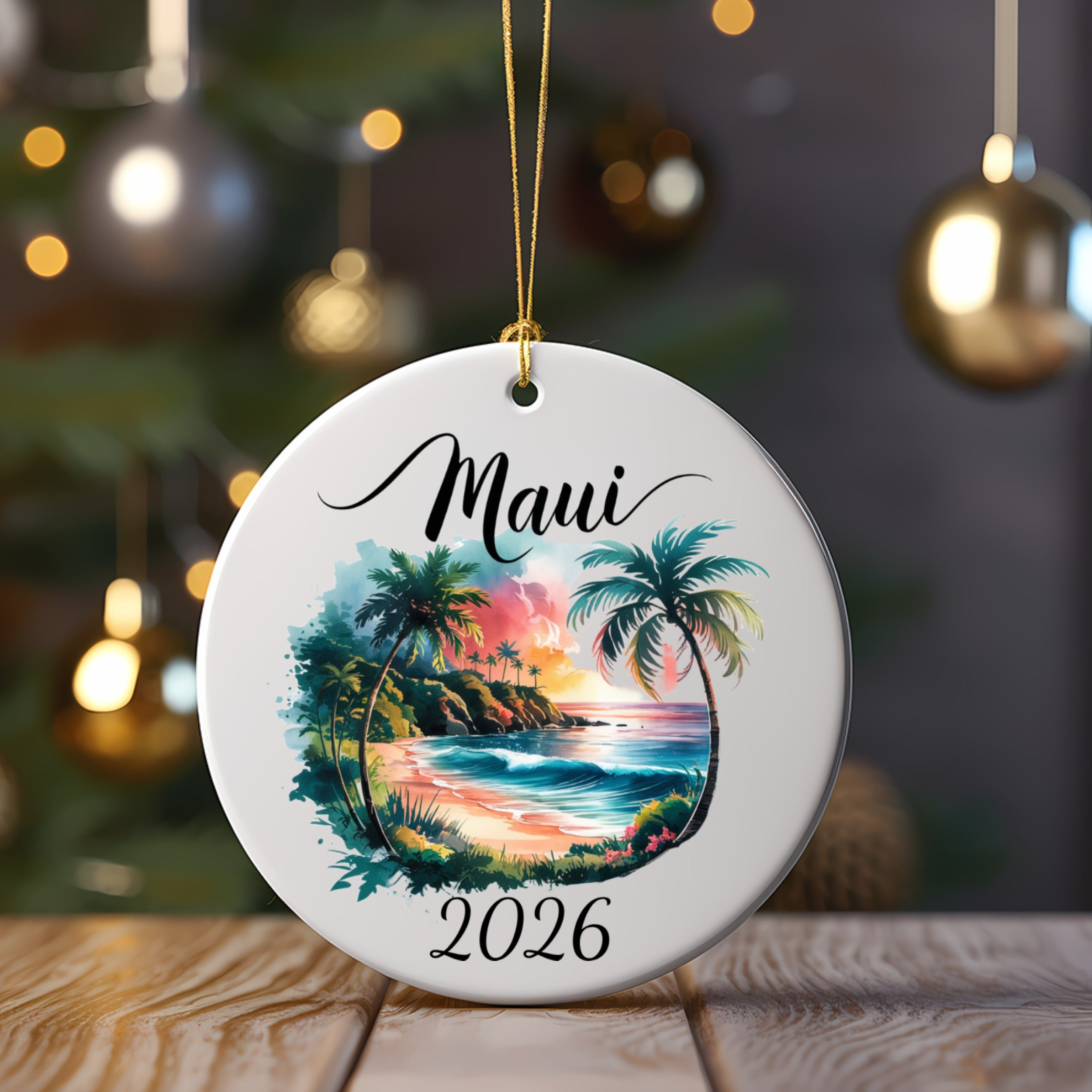 Round ornament with "Maui 2026" text and a tropical beach scene.