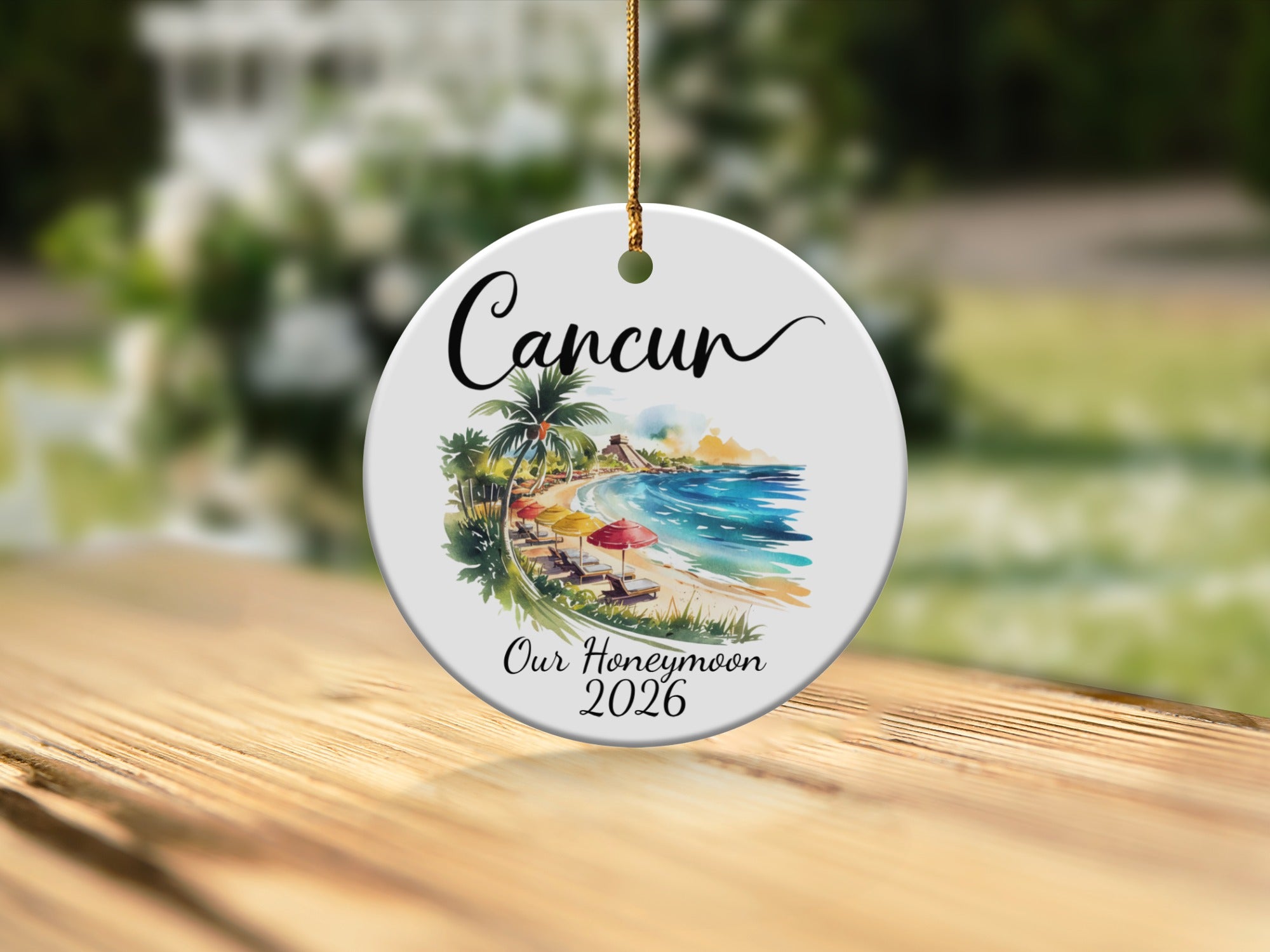 Cancun honeymoon ornament 2026 with beach scene.