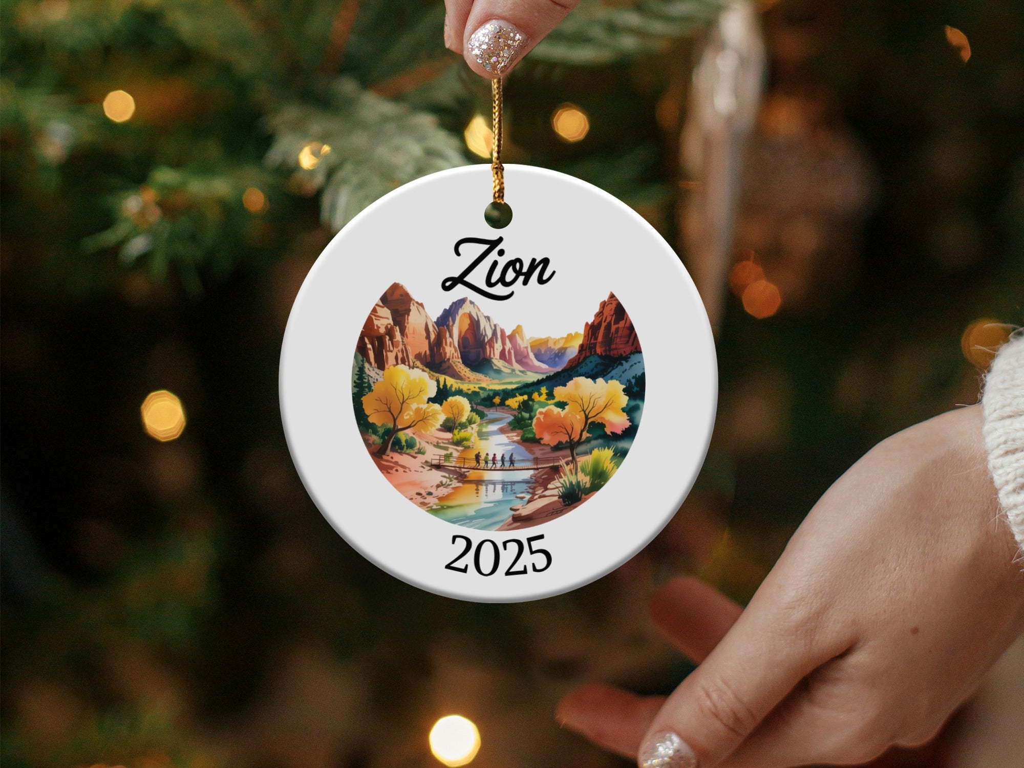 Circular ornament with "Zion 2025" and desert landscape scene.