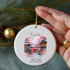 Round ornament with Kyoto temple and cherry blossoms, dated 2026.