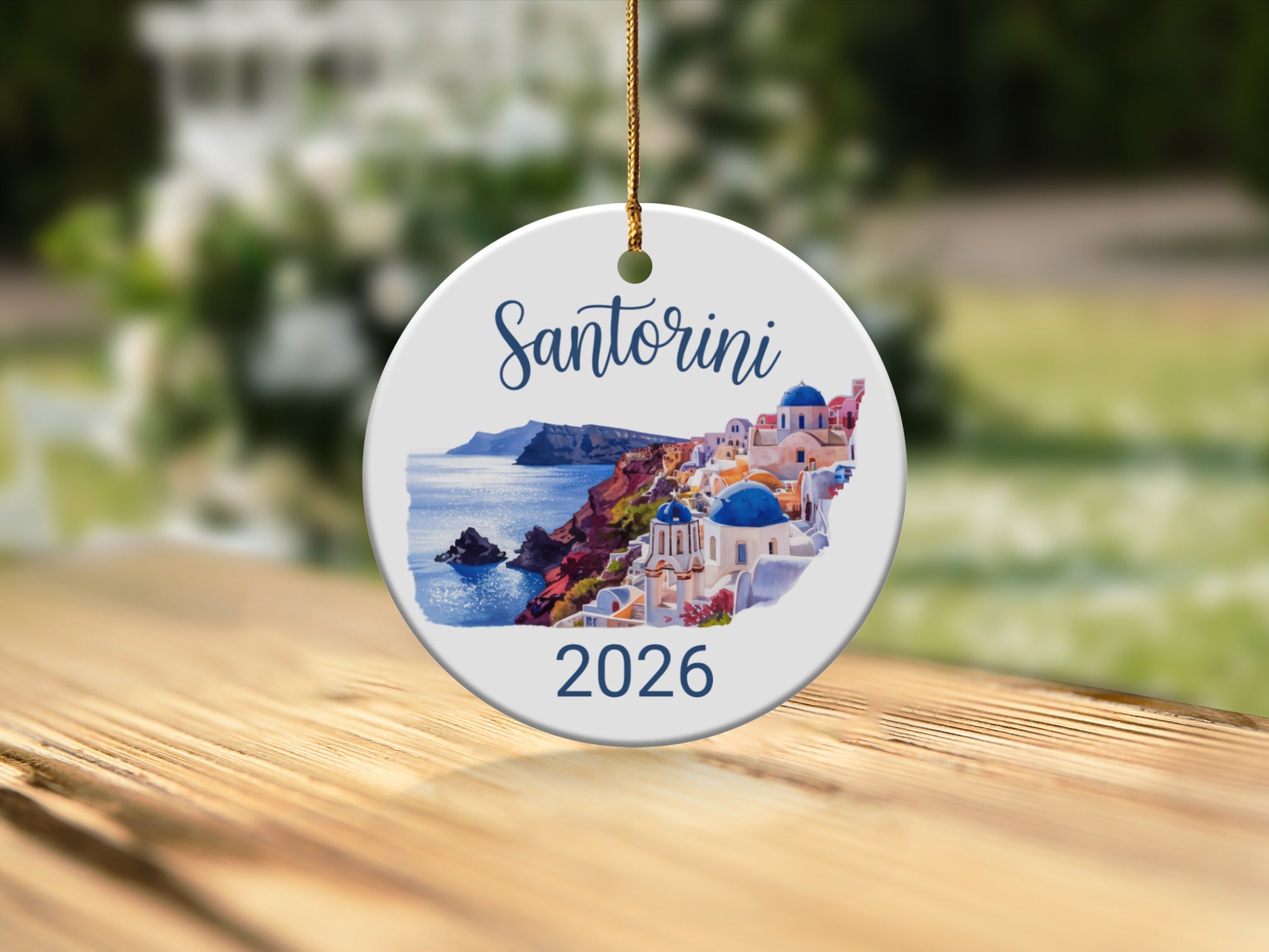 Santorini village scene ornament with year 2026.