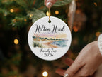 Round ceramic ornament with Hilton Head Family Trip 2026 text and beach scene.