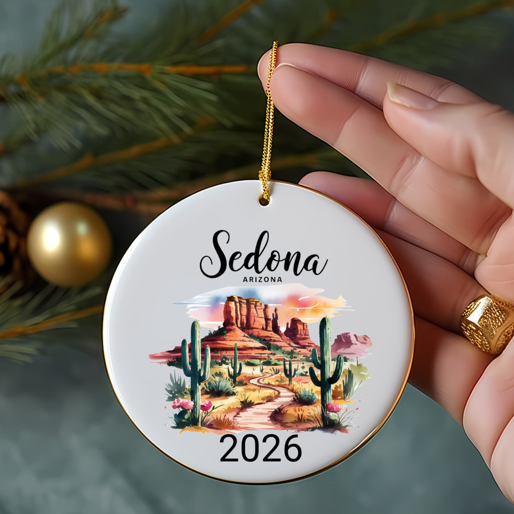 Round ornament with Sedona, Arizona landscape art and "2026" text.