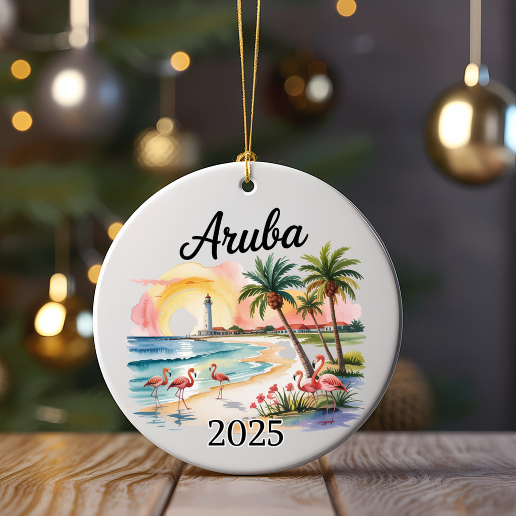 Round ornament with Aruba 2025, flamingos, palm trees, and lighthouse.