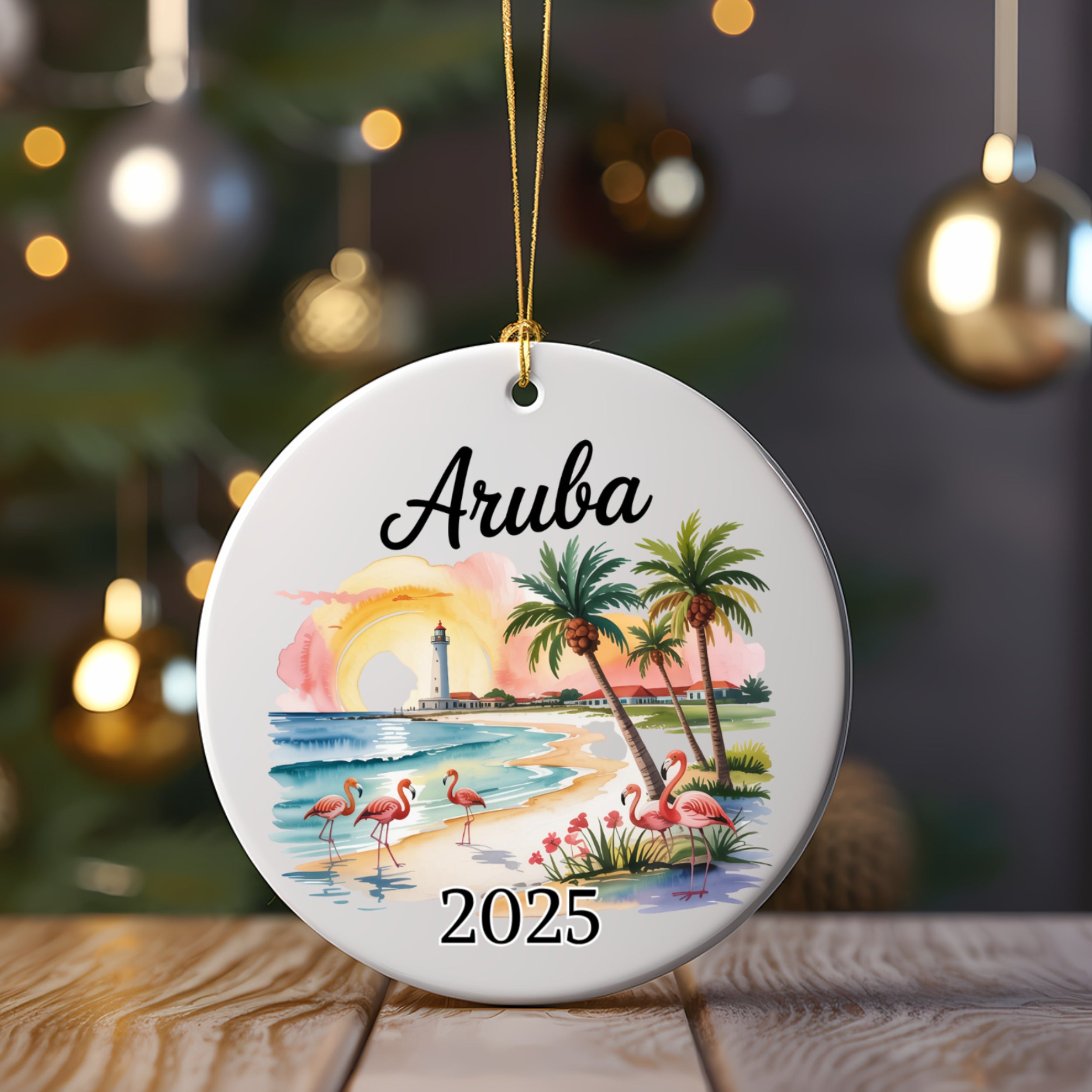 Round ornament with Aruba 2025, flamingos, palm trees, and lighthouse.