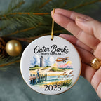 Outer Banks North Carolina 2025 round ornament with beach scene.