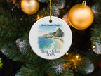 Round ornament depicting Rio de Janeiro beach scene with text "Lisa + John 2026".