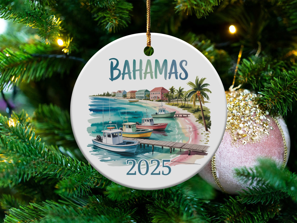 Bahamas Christmas ornament with boats, pier, and buildings on a beach.