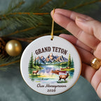 Grand Teton ornament with deer, canoes, and "Our Honeymoon 2026" text.