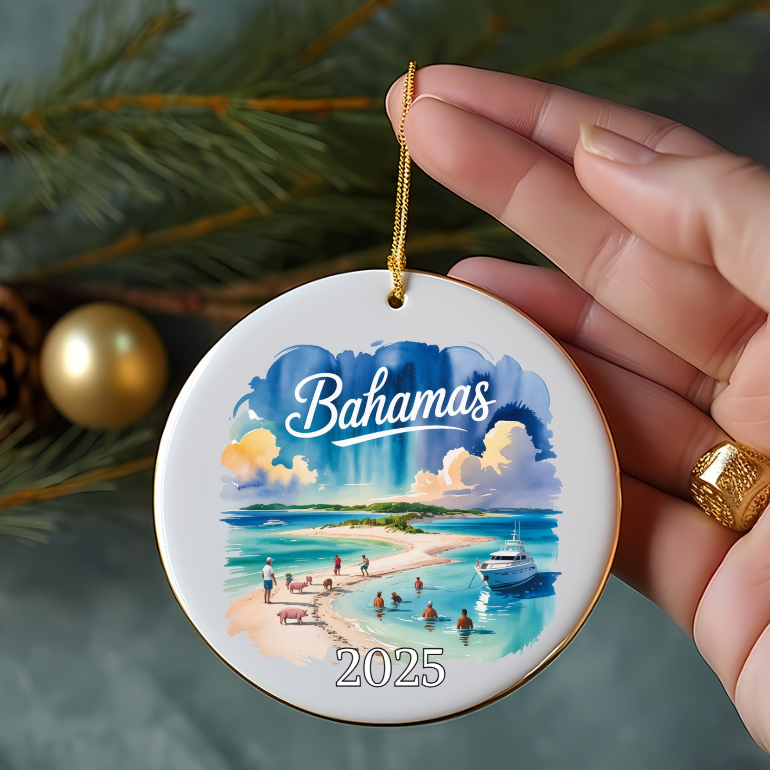 Bahamas 2025 ornament featuring a beach scene with people and a boat.