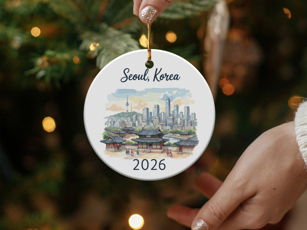 Round ornament depicting Seoul, Korea skyline with "Seoul, Korea" and "2026".