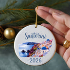 Santorini 2026 ceramic ornament with blue domed buildings and sea.