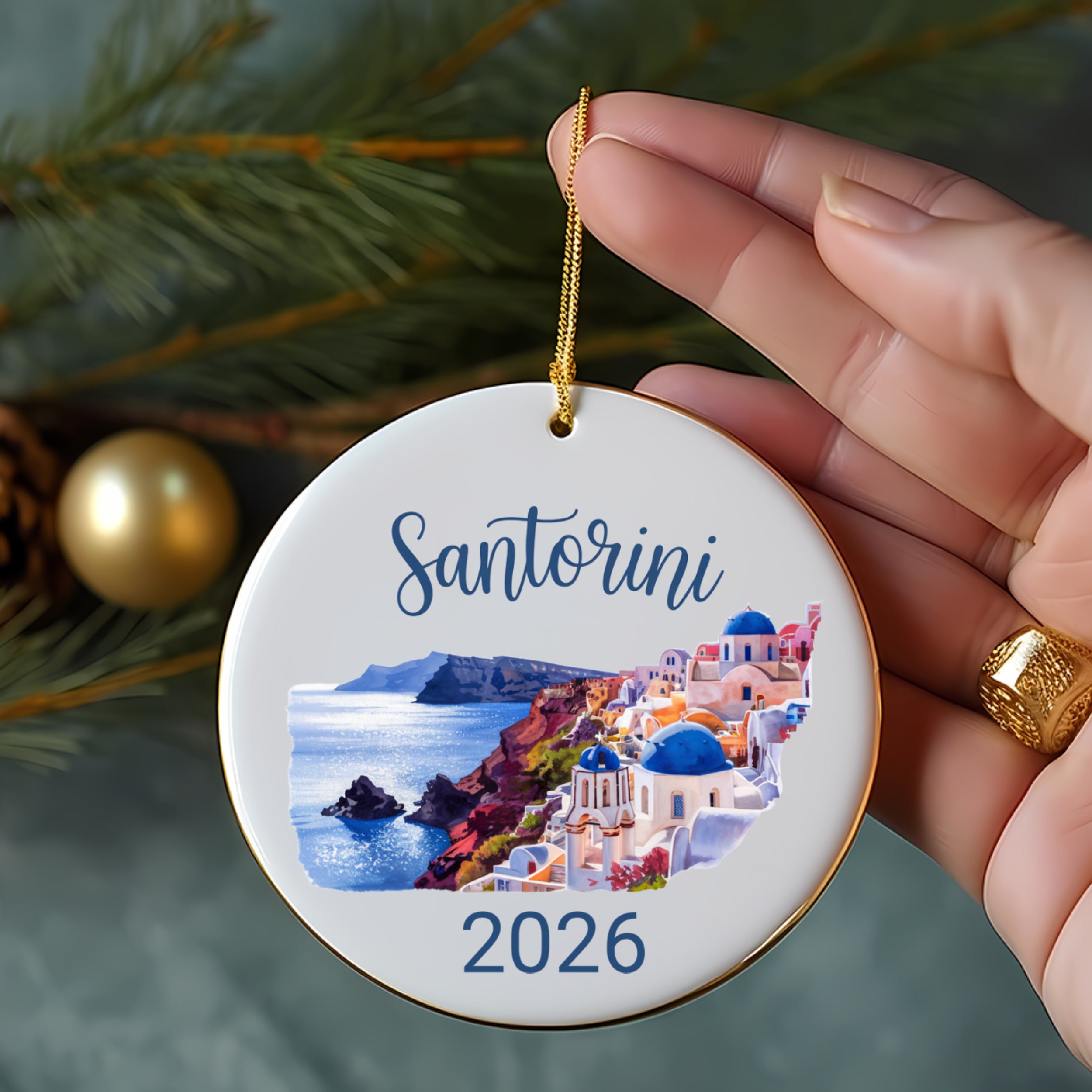 Santorini 2026 ceramic ornament with blue domed buildings and sea.
