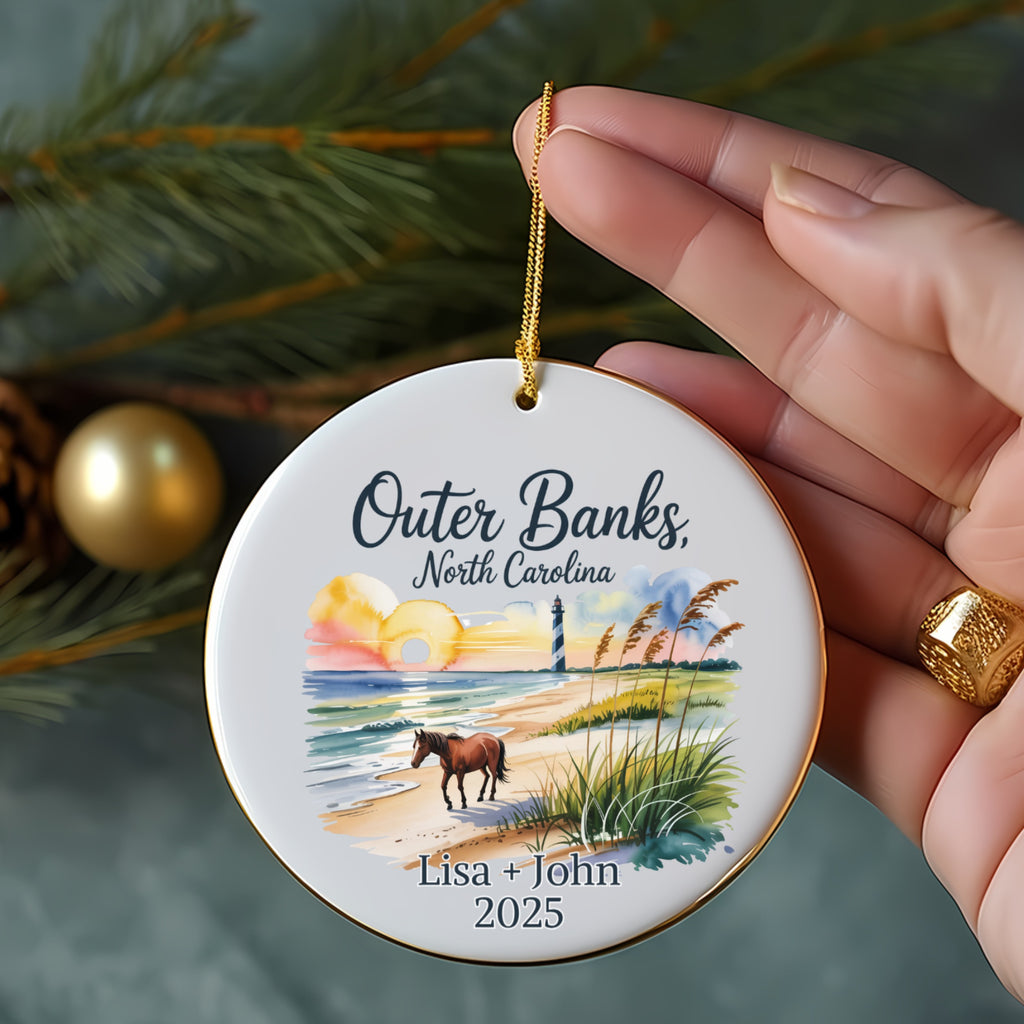 Outer Banks, North Carolina ornament with beach, lighthouse, horse, and names Lisa + John 2025.
