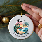 Round ornament with "Maui Our Honeymoon 2026" and beach scene.