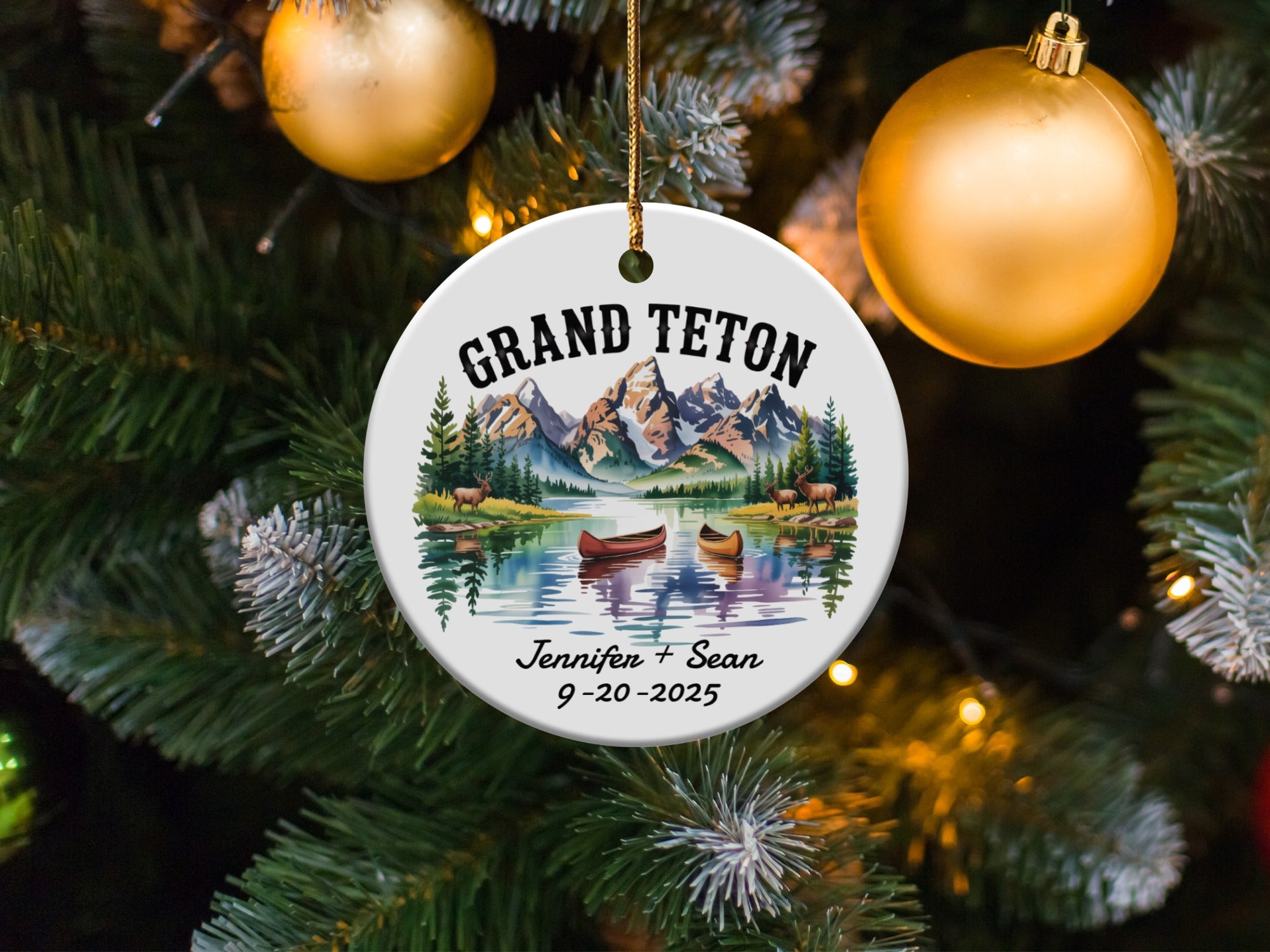 Grand Teton ornament with names and date, on a Christmas tree.