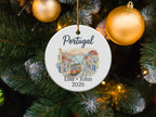 Round Portugal ornament with tram, buildings, text "Lisa + John 2026".