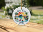 Round Bora Bora ornament with palm trees, kayaks, and "2025" text.