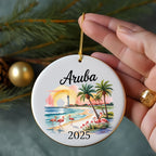 Aruba ceramic ornament with flamingos, palm trees, and lighthouse.