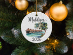 Round ceramic ornament with "Maldives 2026" and overwater bungalows.