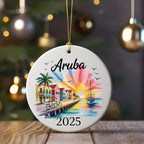 Round ornament with "Aruba 2025" and colorful beach scene.