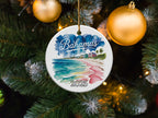 Christmas ornament depicting colorful beach houses and the year 2025.