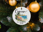 Round ornament with beach scene and text "Cancun Our Honeymoon 2026".