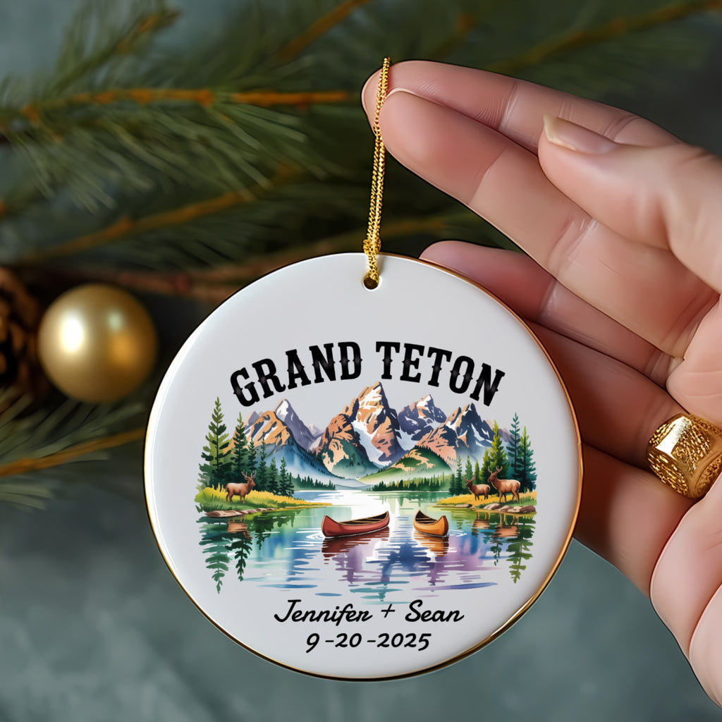 Grand Teton ornament with mountains, lake, canoes, and personalized text.
