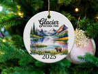 Glacier National Park 2025 ornament featuring a bear by a lake with mountains.