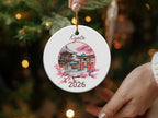 Round ceramic ornament with Kyoto temple, cherry blossoms, and year 2026.