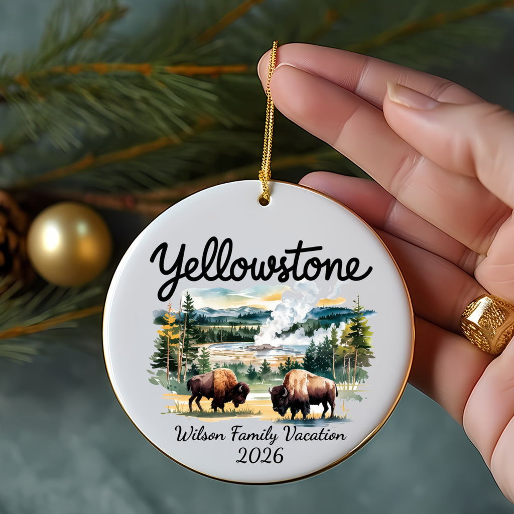 Yellowstone ornament with bison and geyser, "Wilson Family Vacation 2026".