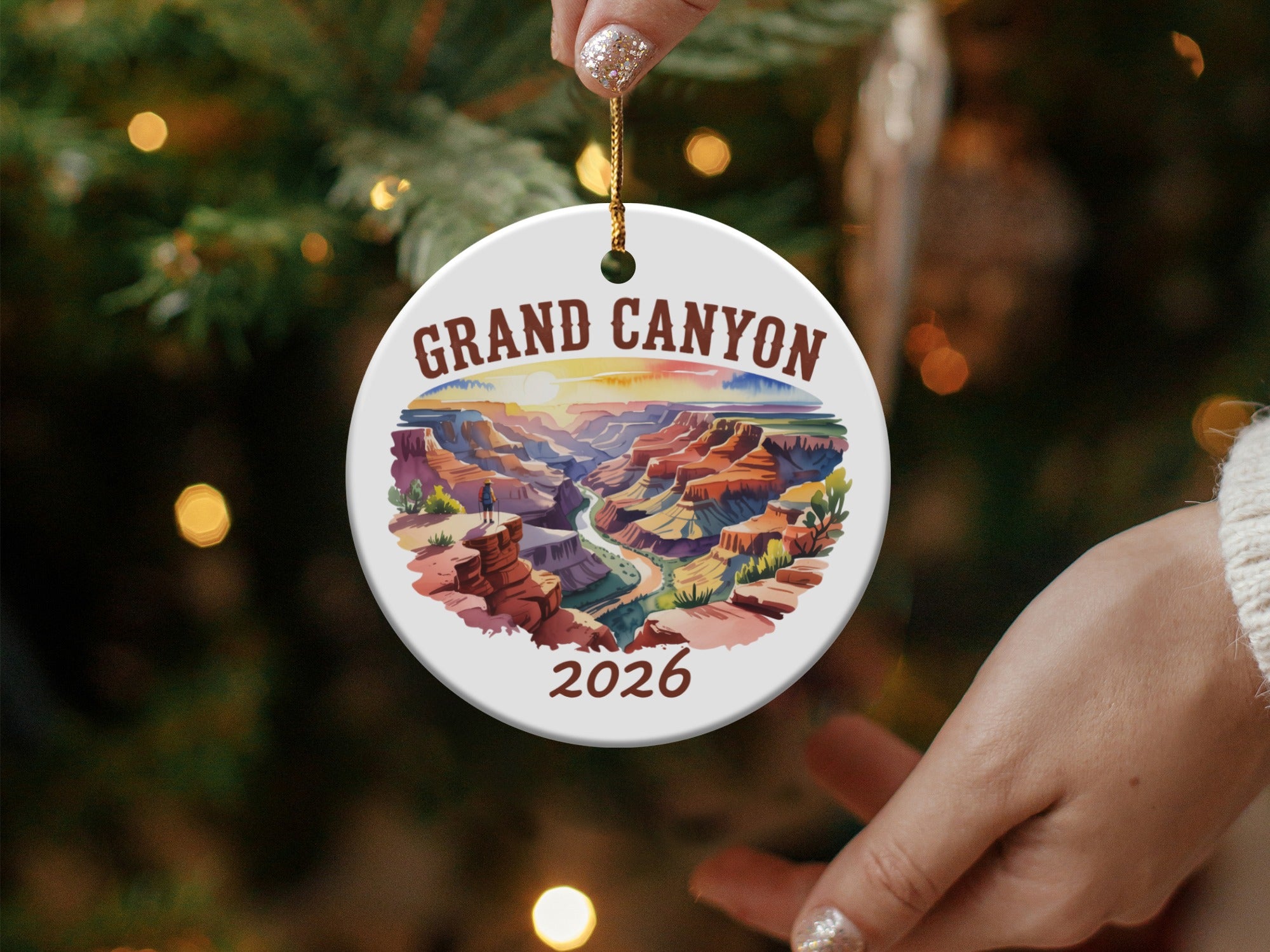 Grand Canyon 2026 round ceramic ornament with a scenic overlook.
