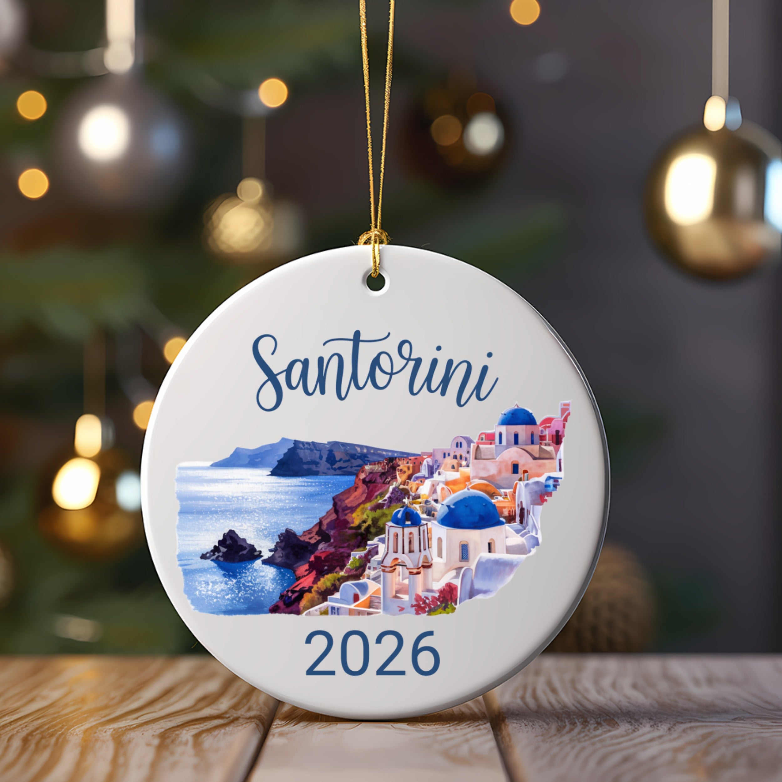 Santorini ornament with year 2026 and coastal buildings.