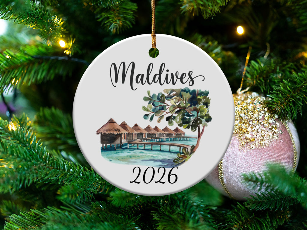 Maldives 2026 ornament featuring overwater bungalows and palm trees.