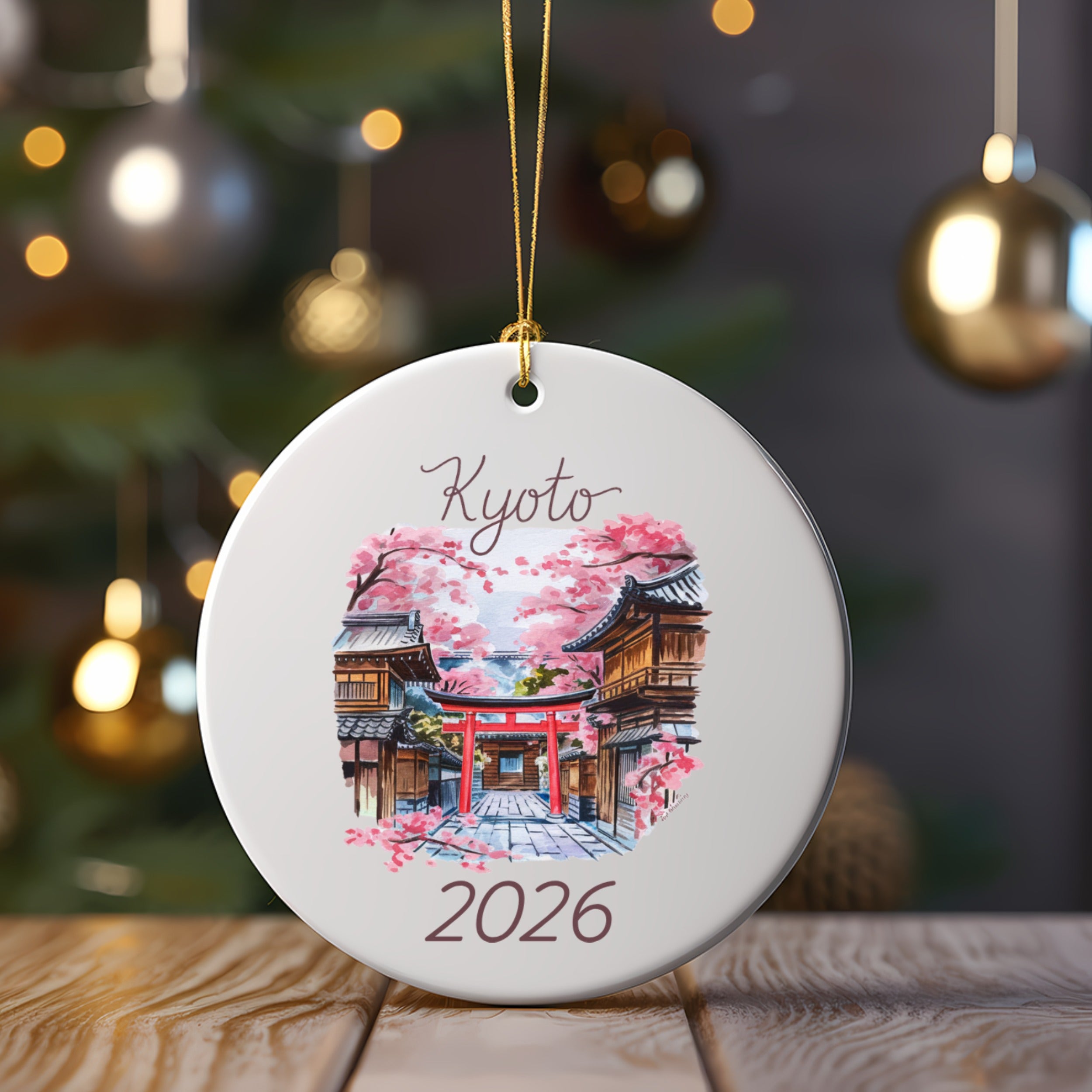 Kyoto 2026 ornament with a red torii gate and cherry blossoms.