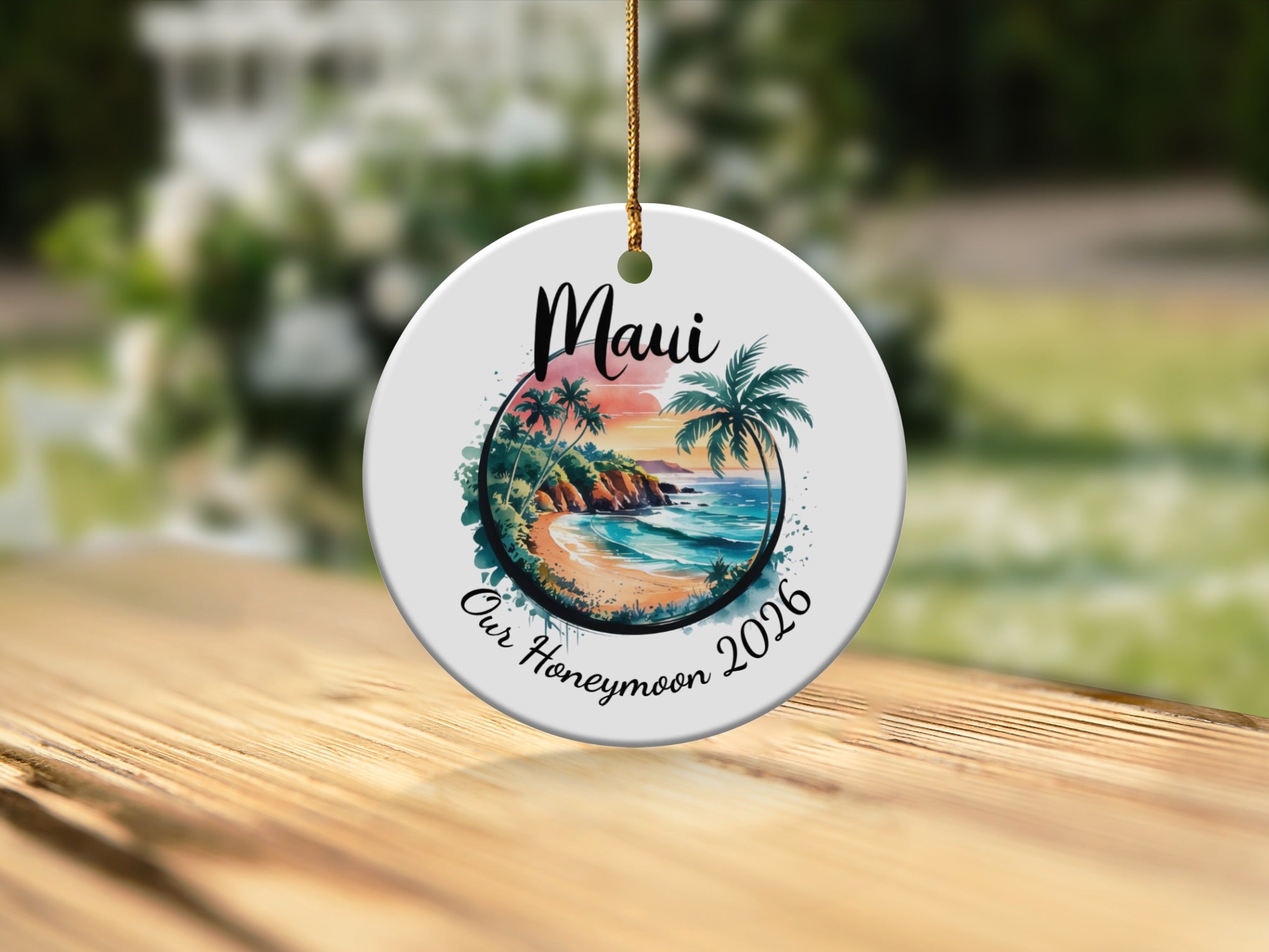 Round ornament with "Maui Our Honeymoon 2026" and a beach scene.