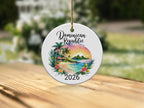 Dominican Republic beach scene ornament with palm trees and a sunset, dated 2026.