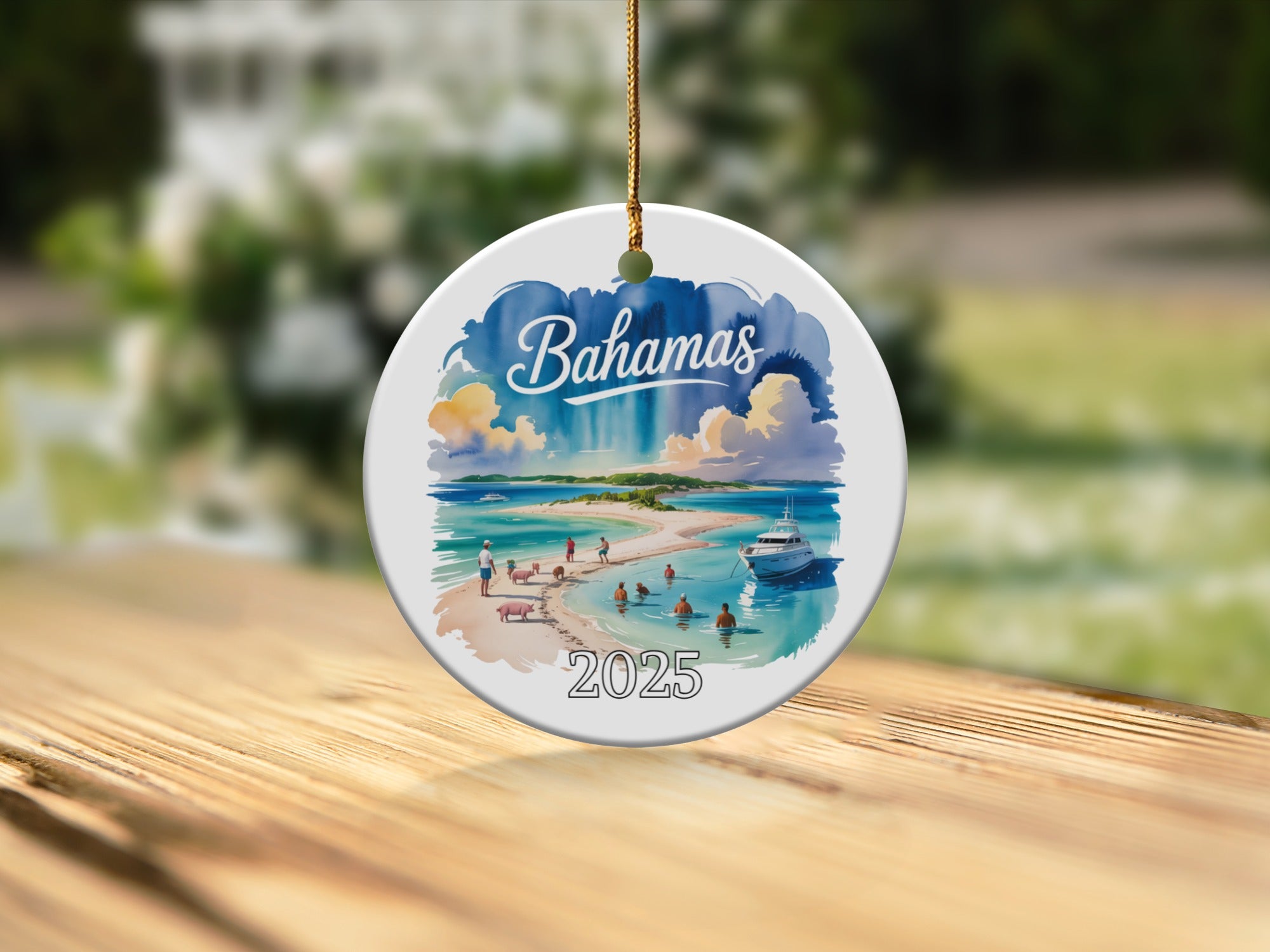Bahamas ceramic ornament with beach scene, pigs, and boat, dated 2025.