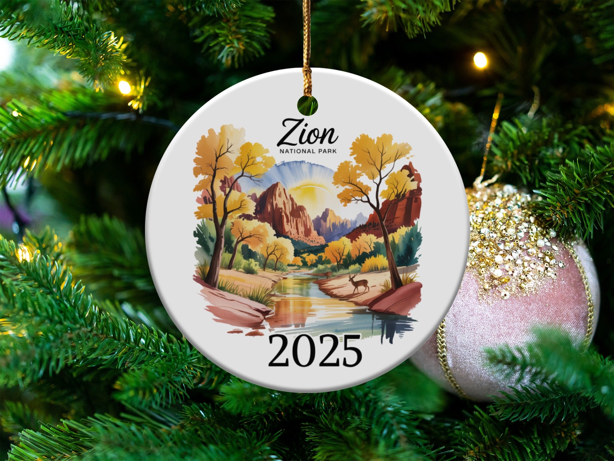 Round ceramic ornament with Zion National Park landscape and year 2025.