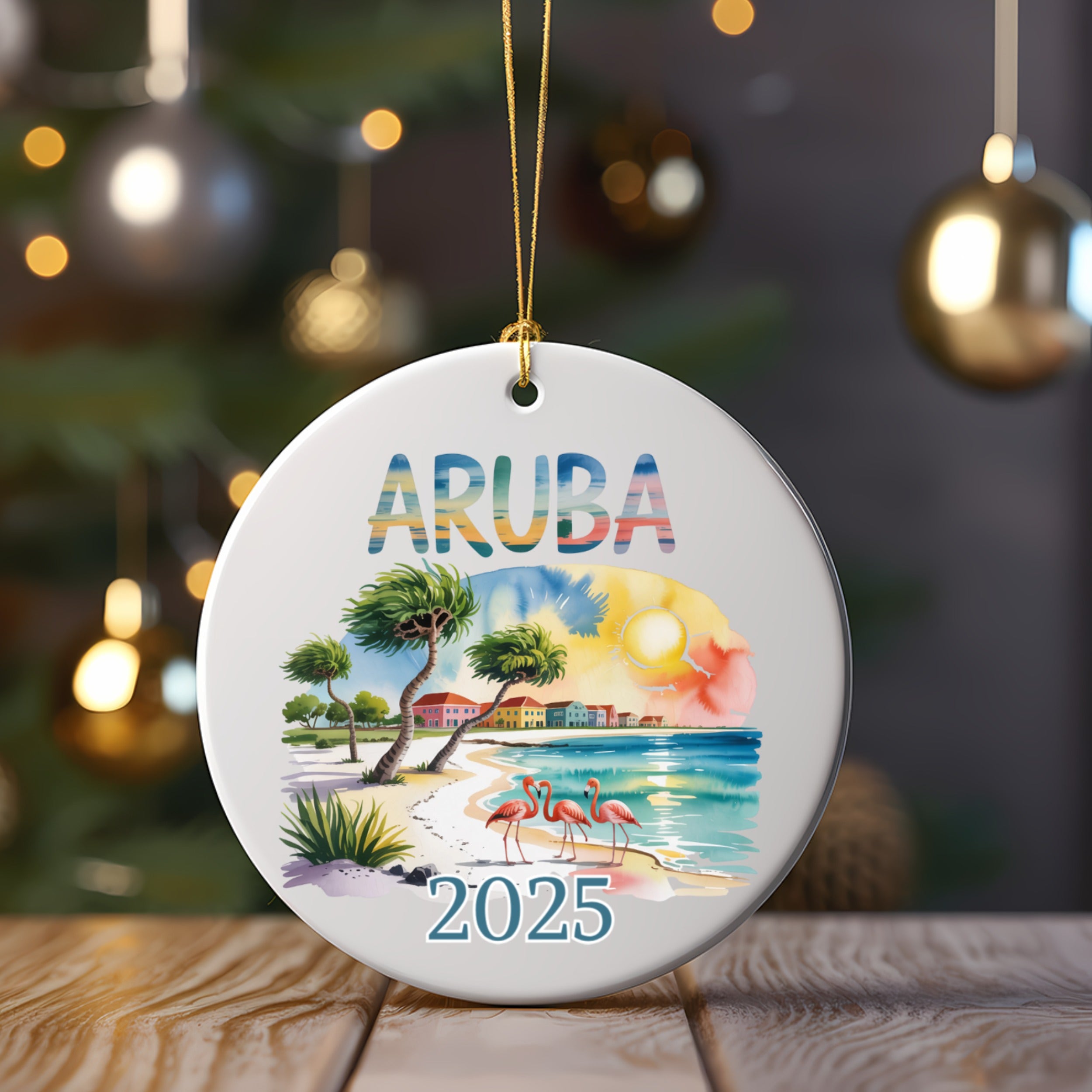 Circular 2025 Aruba ornament with flamingos, beach, and palm trees.
