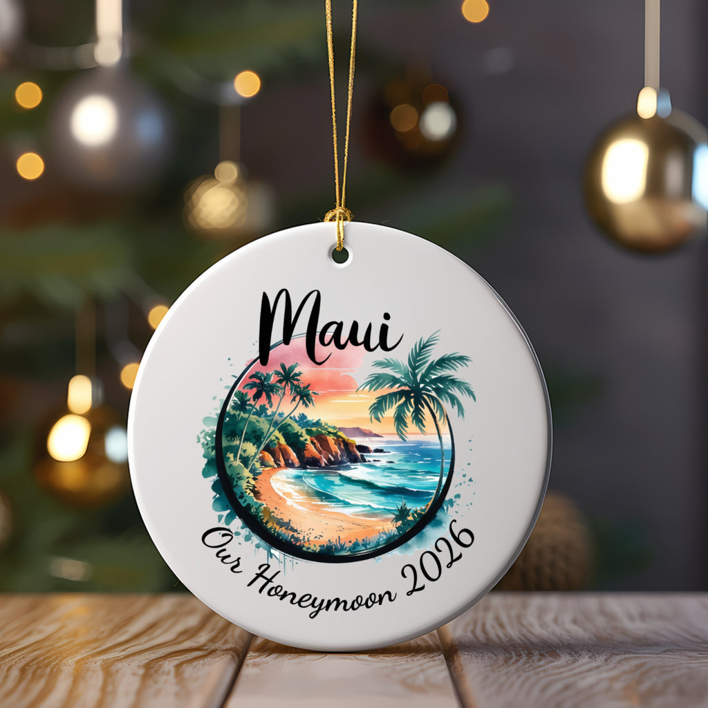 Round ornament with "Maui Our Honeymoon 2026" and a tropical beach scene.
