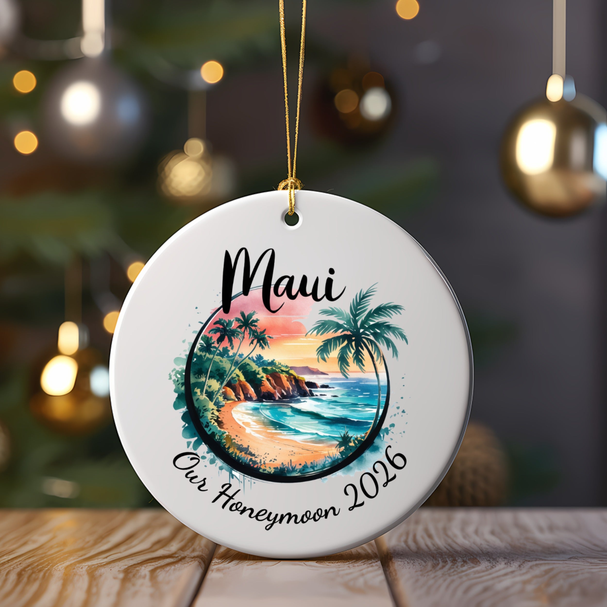 Round ornament with "Maui Our Honeymoon 2026" and a tropical beach scene.