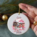 Kyoto ornament with torii gate, pagoda, and cherry blossoms, year 2026.