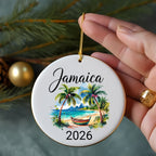 Round Jamaica ornament with palm trees, beach, and a boat, dated 2026.