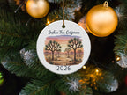 Round ornament with Joshua trees and "Joshua Tree, California 2026" text.